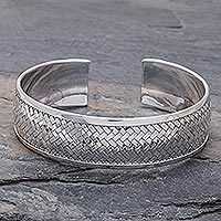 Sterling silver cuff bracelet, 'Weaving Tales' - Sterling Silver Cuff Bracelet with Woven Motif
